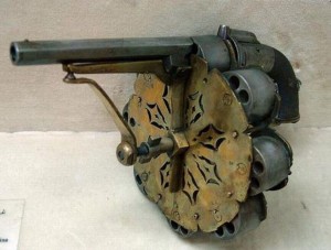 very strange cap and ball revolver with extra cylinders attached