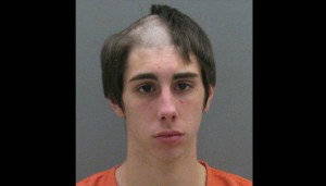 pickaxe attacker with head shaved half way