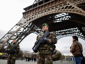 troops guard the eiffel tower